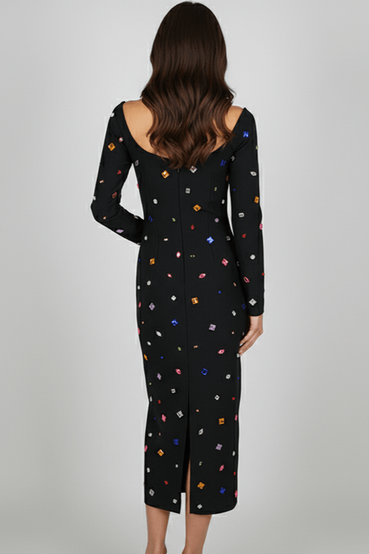 Aurora Crystal Dress by Luxe Lane | from Luxe Lane | SKU: | Barcode: | Options: Black S | Black dress with colorful geometric pattern worn by a model on a gray background