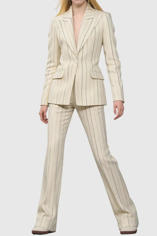 Ivory Pinstripe Tailored Blazer & Flared Pants Suit by Shine | Blazer from Luxe Lane | SKU: | Barcode: | Options: S(2) | Person wearing a beige pinstripe suit on a white background