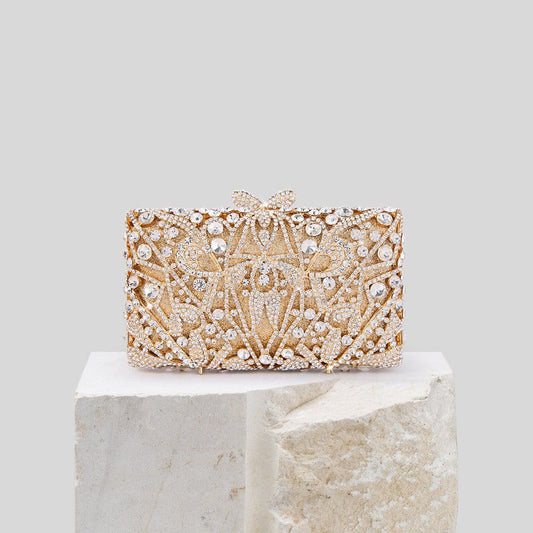 Rhinestone Cutout Diamond Evening Bag by CJ | 0 from Luxe Lane | SKU: CJNS151970001AZ | Barcode: | Options: Red | Elegant gold clutch with intricate designs on a light gray background