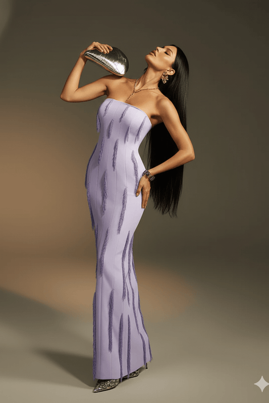 Strapless Beaded Fringe Evening Gown by Luxe Lane | heath gown from Luxe Lane | SKU: -1 | Barcode: | Options: PURPLE S(2) | Woman in a strapless purple gown holding a silver clutch against a neutral background