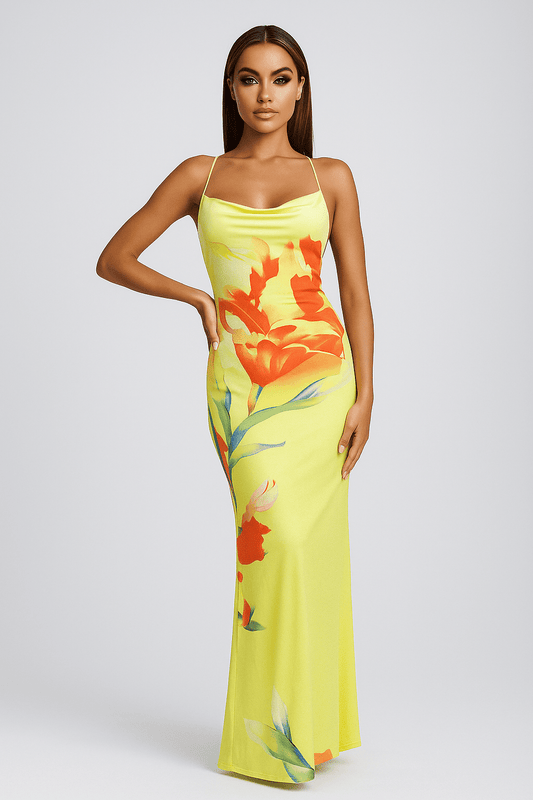 Sunset Bloom Satin Gown by Luxe Lane | from Luxe Lane | SKU: | Barcode: | Options: Yellow S | Woman wearing a yellow floral dress on a white background