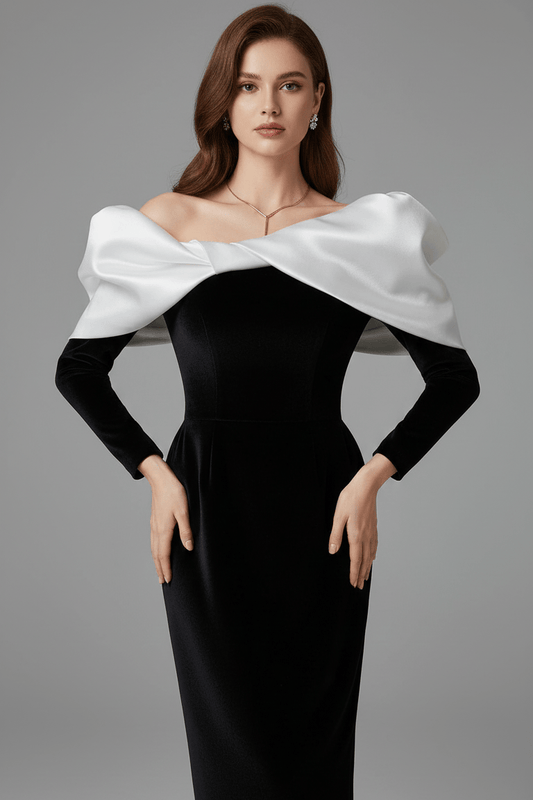 V - Neck Bow Detail Bodycon Maxi Dress by Luxe Lane | Dresses from Luxe Lane | SKU: -1 | Barcode: | Options: Black XS | Woman wearing a black dress with white bodice against a gray background