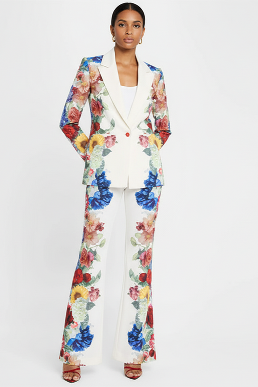 Woman wearing a floral suit on a white background