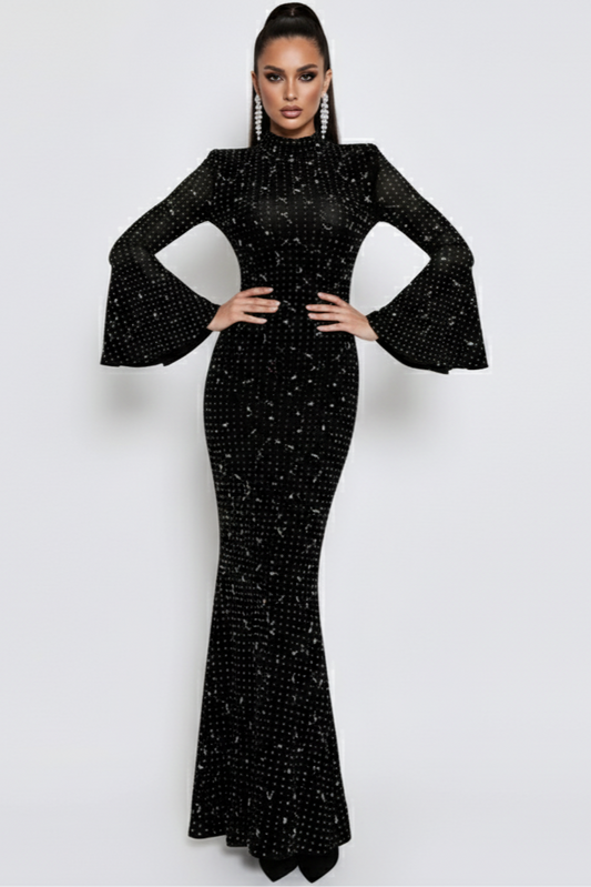 Black beaded evening gown on a white background