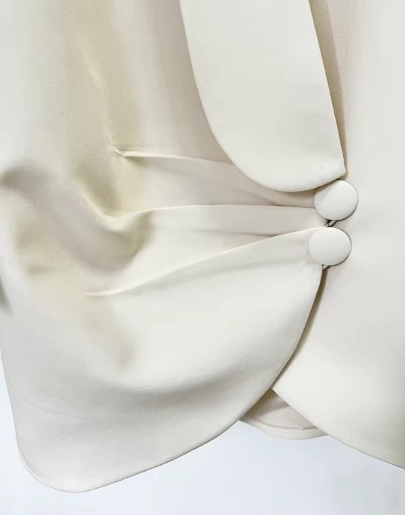 close-up of Luxe Lane black sequin fabric showing intricate bead patterns and fine handwork