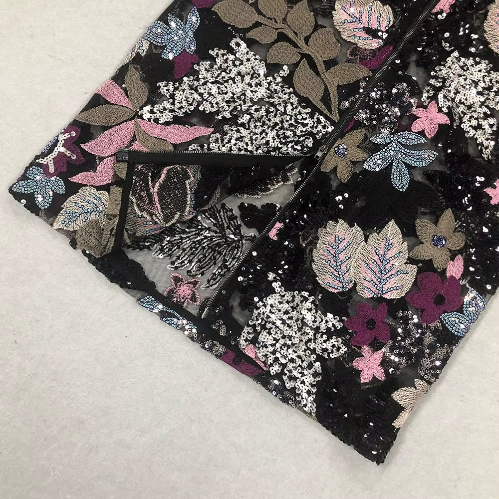 Sequin Floral Embroidered Maxi Evening Dress by Luxe Lane | Party dresses from Luxe Lane | Options: black S(2) | macro shot of Luxe Lane hand-embroidered sequins with gold and silver thread on mesh base