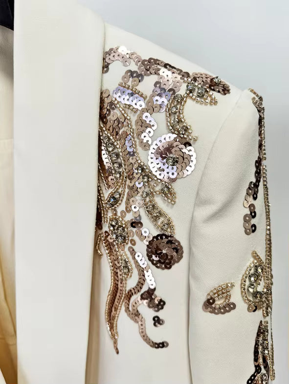 macro view of Luxe Lane white blazer bead embroidery featuring gold and silver sequins