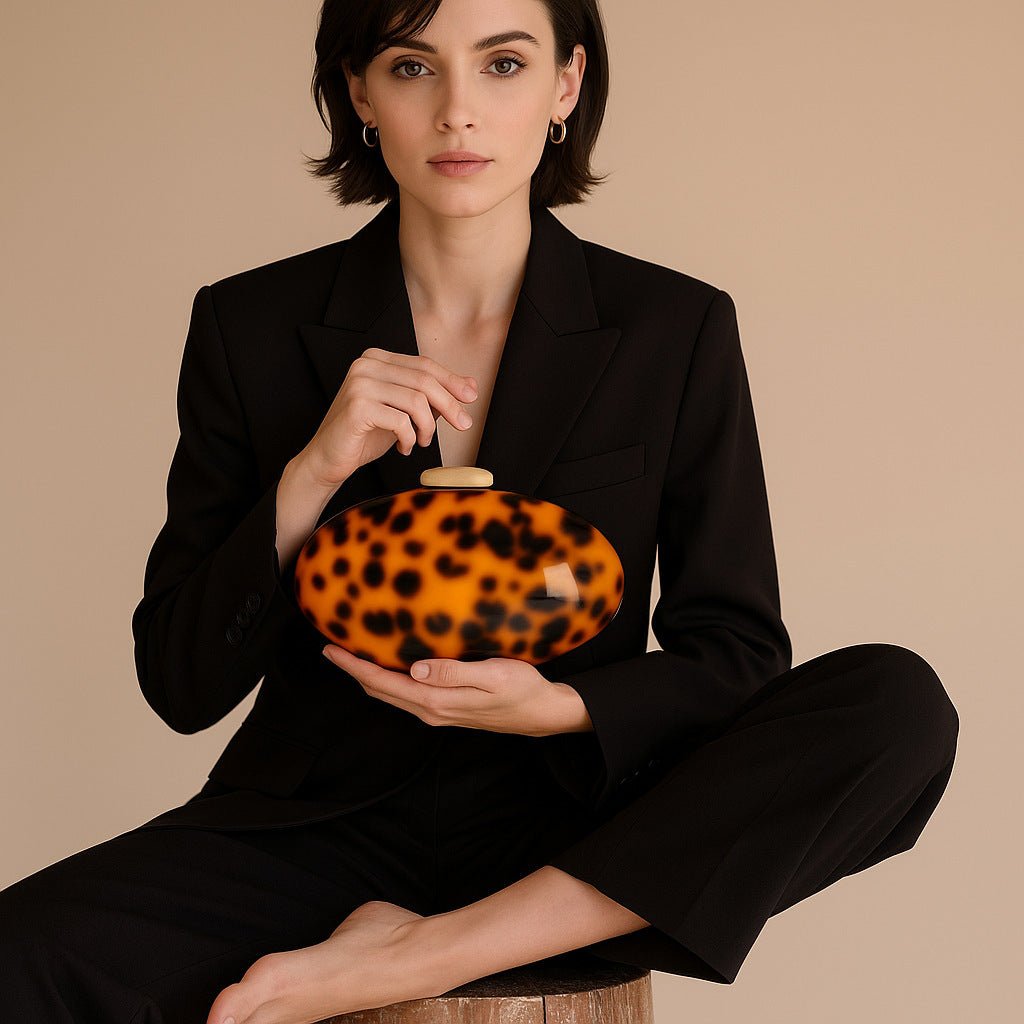 Acrylic Amber Evening Clutch Bag by CJ | 0 from Luxe Lane | SKU: CJNS256524101AZ | Barcode:  | Options: Amber | Acrylic Amber Evening Clutch Bag