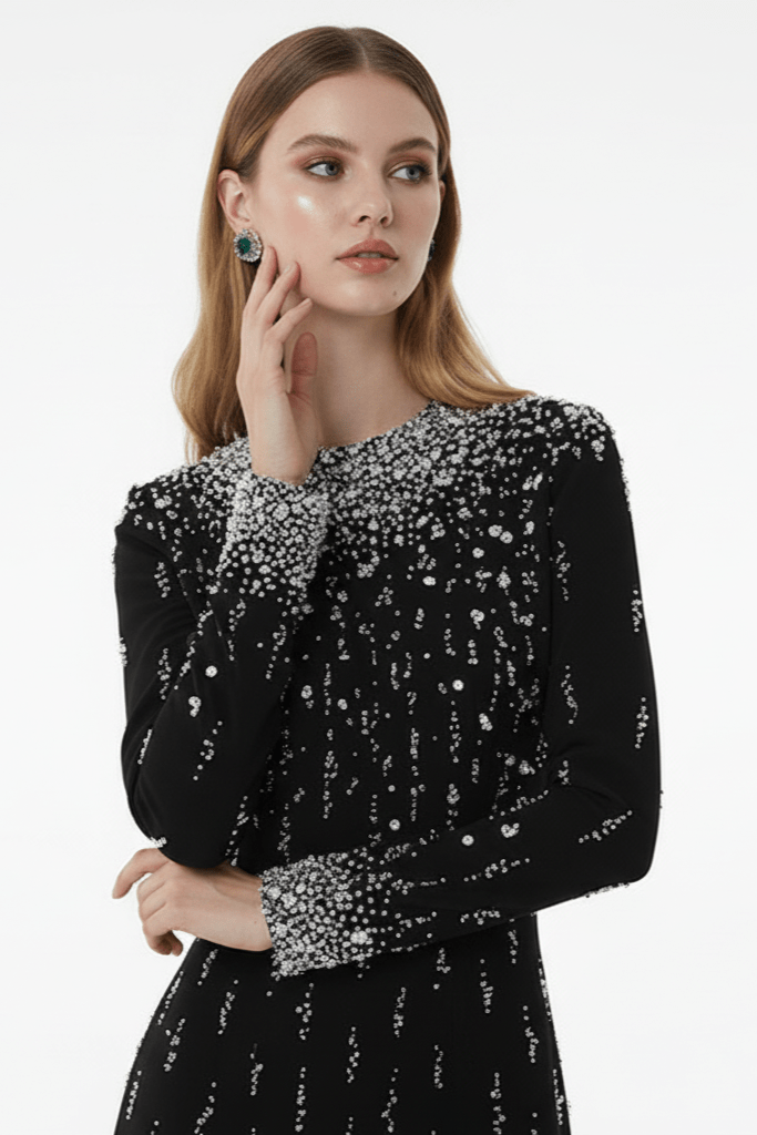 Amarise Beaded Sequin Evening Gown by Shine | heath gown from Luxe Lane | SKU: W11558-1 | Barcode:  | Options: White S | Woman wearing a black dress with silver sequin details on a white background