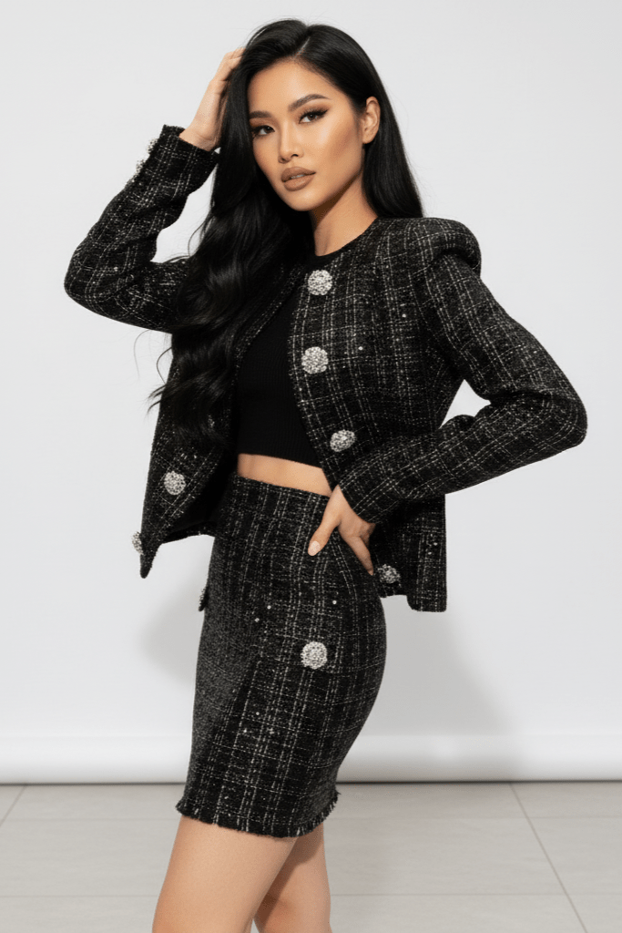 Astrid Noir Rhinestone Tweed Blazer & Mini Skirt Set by Shine | one set from Luxe Lane | SKU: -1 | Barcode:  | Options: Black S | Woman wearing a black and silver tweed outfit with a white background