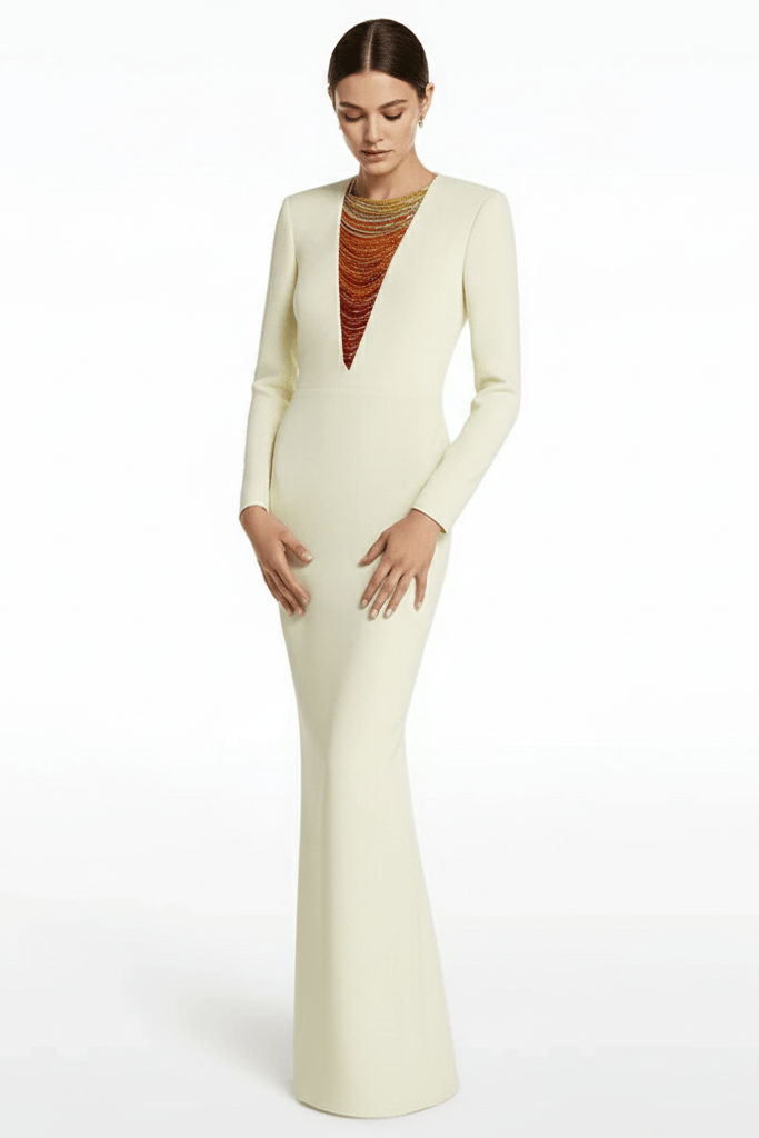 Aurora Radiance Gradient Chain Beaded by Luxe Lane | heath gown from Luxe Lane | SKU:  | Barcode:  | Options: White S | Woman wearing a long, light - colored dress with a fitted bodice and flared skirt on a white background.