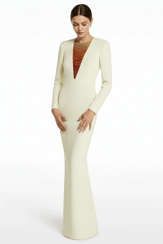 Aurora Radiance Gradient Chain Beaded by Luxe Lane | heath gown from Luxe Lane | SKU:  | Barcode:  | Options: White S | Woman wearing a long, light - colored dress with a fitted bodice and flared skirt on a white background.