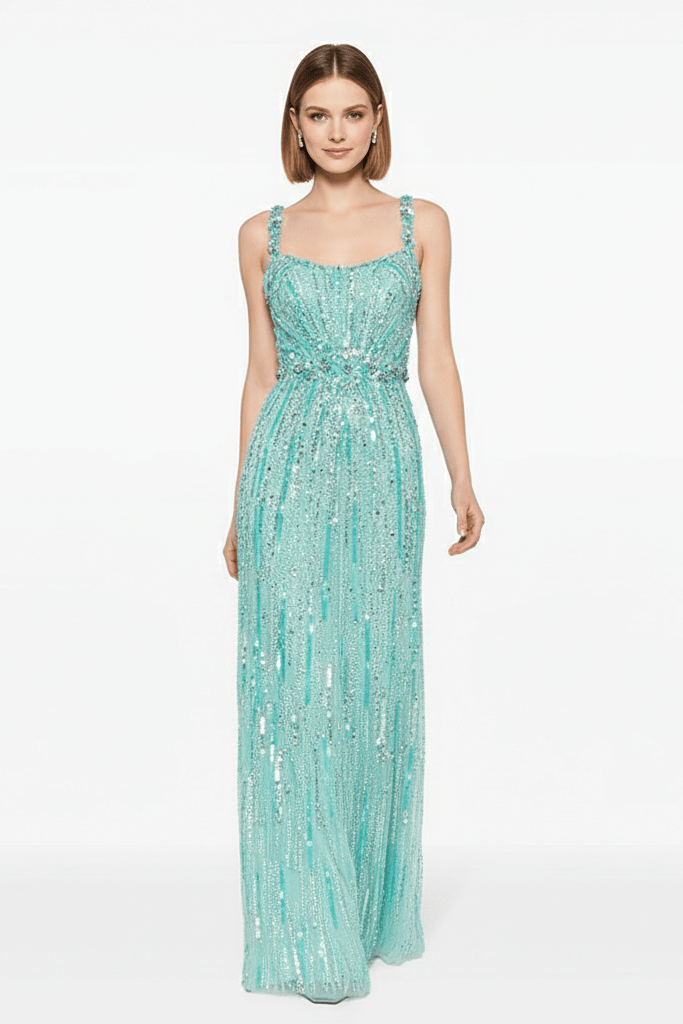 Aveline Sequin Beaded Mesh Gown by Luxe Lane | from Luxe Lane | SKU:  | Barcode:  | Options: Rose Red S | three - quarter pose of model in Luxe Lane turquoise mesh gown with sparkling sequins and slim silhouette