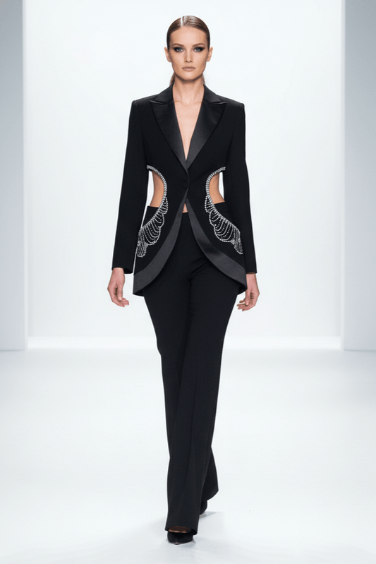 Averis Rhinestone Blazer & Pants Set by Shine | 2 piece long set from Luxe Lane | SKU: -1 | Barcode:  | Options: Black S | Model wearing a black suit with intricate designs on a white background