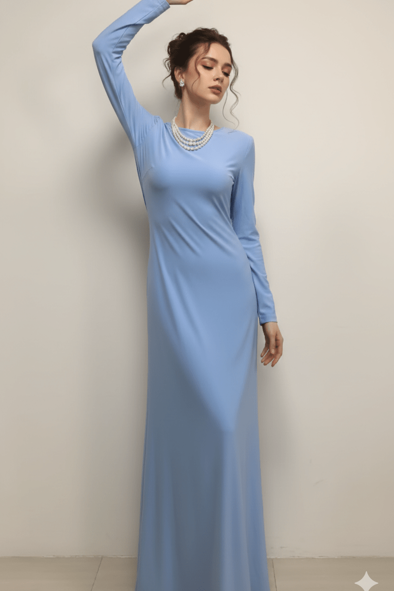 Backless Long Sleeve Draped Maxi Evening Gown by Luxe Lane | from Luxe Lane | SKU: -1 | Barcode:  | Options: Blue S(6) | Woman wearing a long light blue dress against a plain background