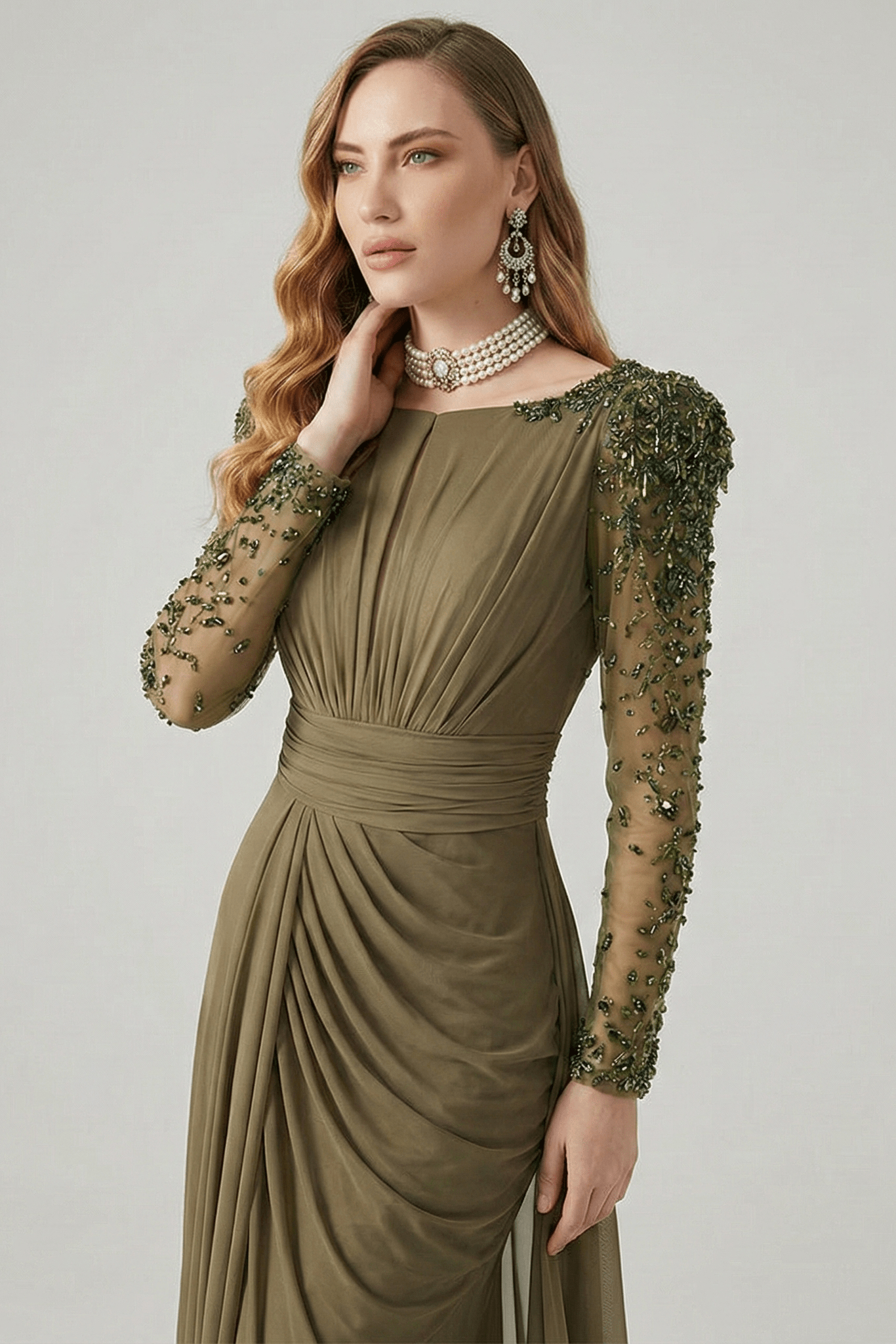 Beaded Long Sleeve High Slit Evening Gown by Guangdong | Party dresses from Luxe Lane | SKU: W11326-1 | Barcode:  | Options: green S(2) | Woman wearing a green evening gown with floral embellishments on a gray background