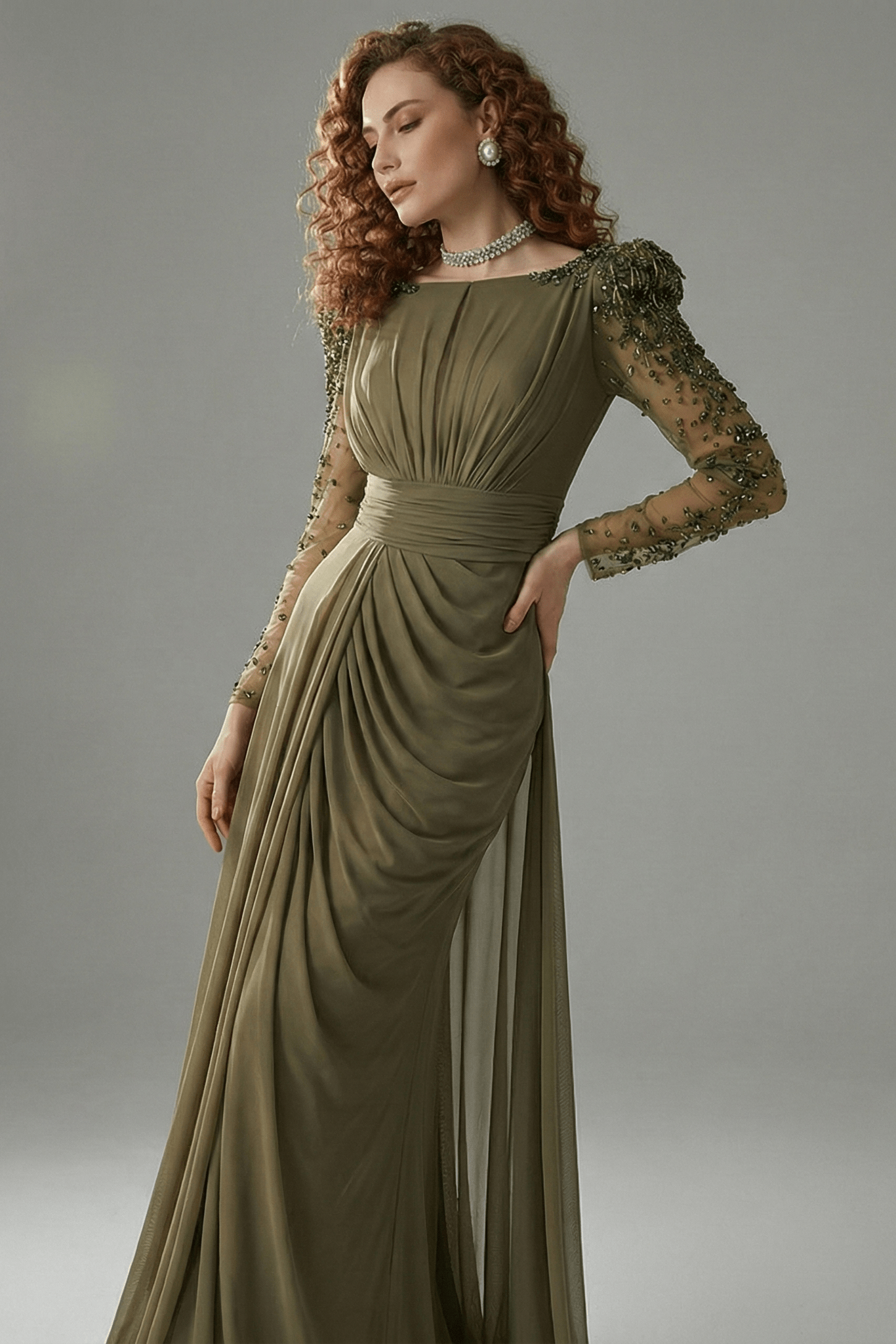 Beaded Long Sleeve High Slit Evening Gown by Guangdong | Party dresses from Luxe Lane | SKU: W11326-1 | Barcode:  | Options: green S(2) | Woman wearing a long, elegant green dress with lace sleeves against a gray background