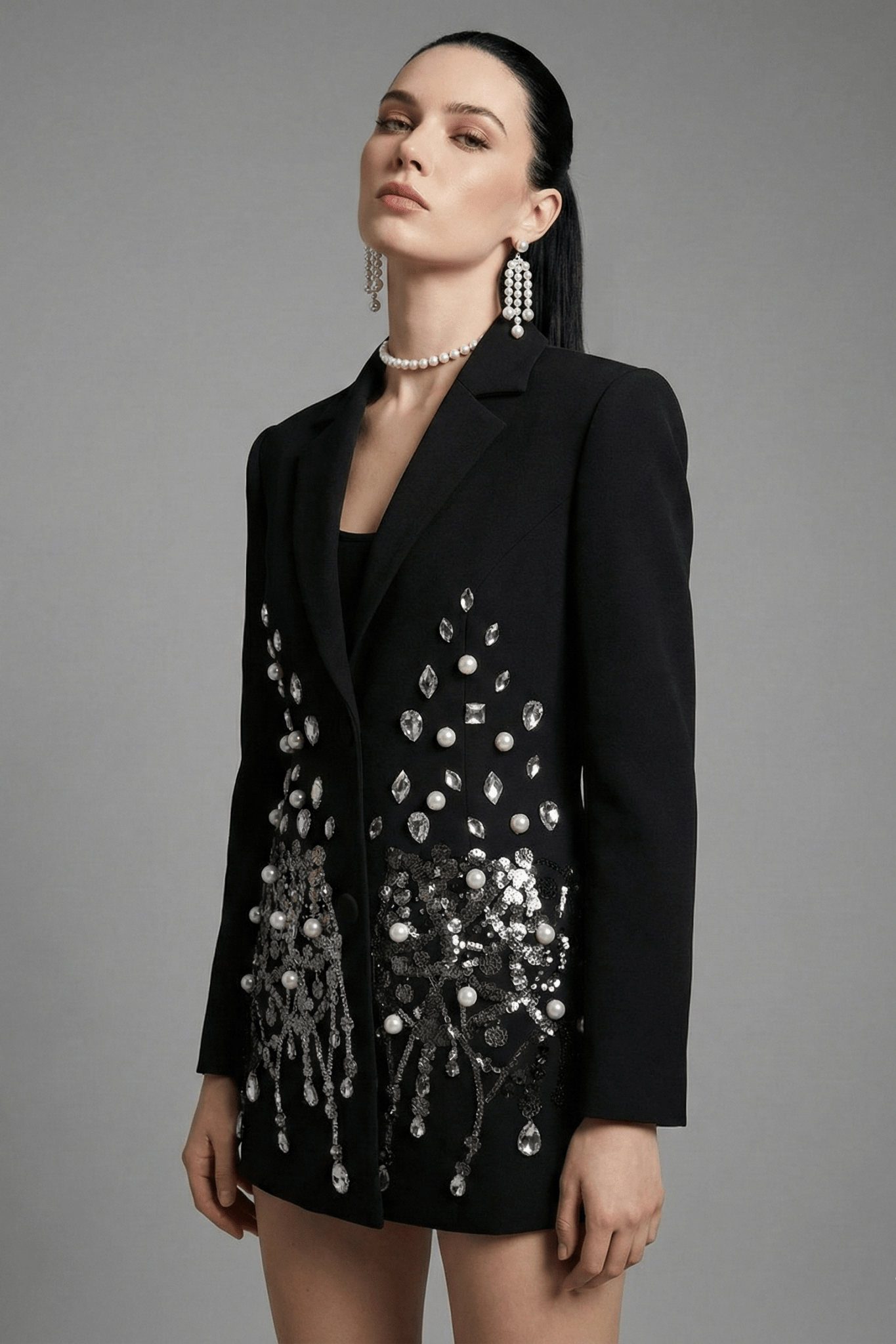 Beaded Single - Breasted Sequin Blazer Dress by Shine | from Luxe Lane | SKU: W11298-1 | Barcode:  | Options: Black S(2) | Woman wearing a black blazer with silver embellishments on a gray background