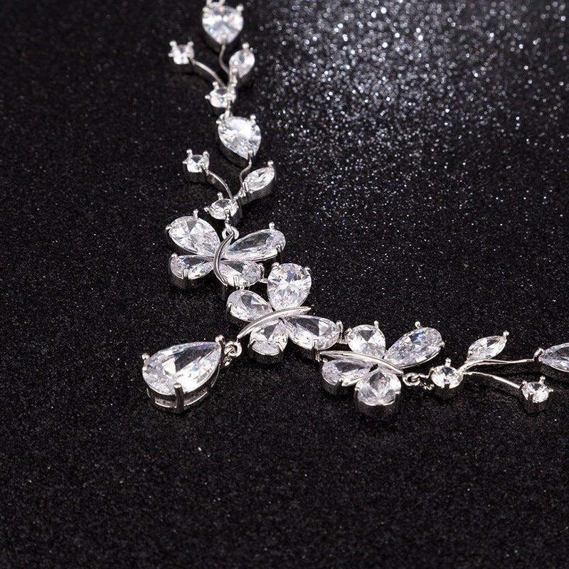 Butterfly Zircon Bridal Necklace & Earrings Set by CJ | 0 from Luxe Lane | SKU: CJYD247022401AZ | Barcode:  | Options: White | Butterfly Zircon Bridal Necklace & Earrings Set