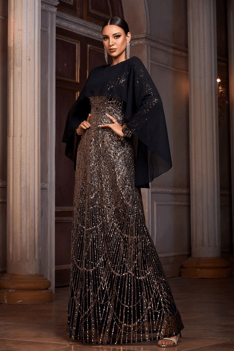 Cassia Black & Gold Sequin Cape Gown by Shine | Evening Dresses from Luxe Lane | SKU: -1 | Barcode:  | Options: Black gold S(6) | Dropshipping Women Garment High End Black and Gold Sequins Long Sleeve Cape Maxi Long Party Gown Luxury Sequin Evening Dresses