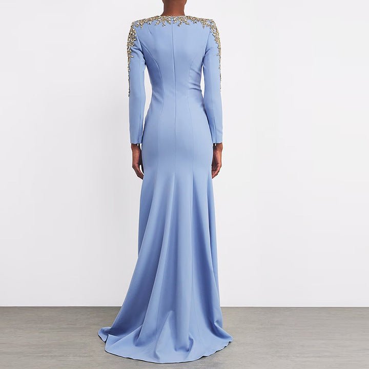 Celeste Regalia Crystal Gown by Luxe Lane | Evening Dresses from Luxe Lane | SKU: W11318-1 | Barcode:  | Options: Sky Blue S | Elegant Light Blue Maxi Occassion Dress Luxurious Beaded Gold Rhinestones Neckline Long Sleeve Formal Party Gown Evening Dresses