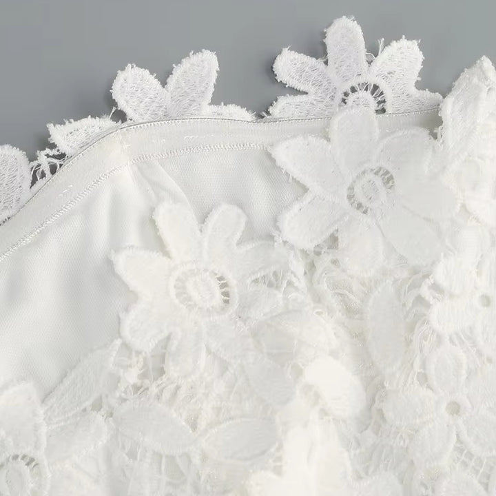 Cerie Blanche Lace Jacquard Romper by Shine | from Luxe Lane | SKU:  | Barcode:  | Options: White XS | Robes Elegantes Pour Femmes Elegant Ladies Event Party Romper Chic White Lace Strapless Floral Jacquard Jumpsuit With Bow Belt