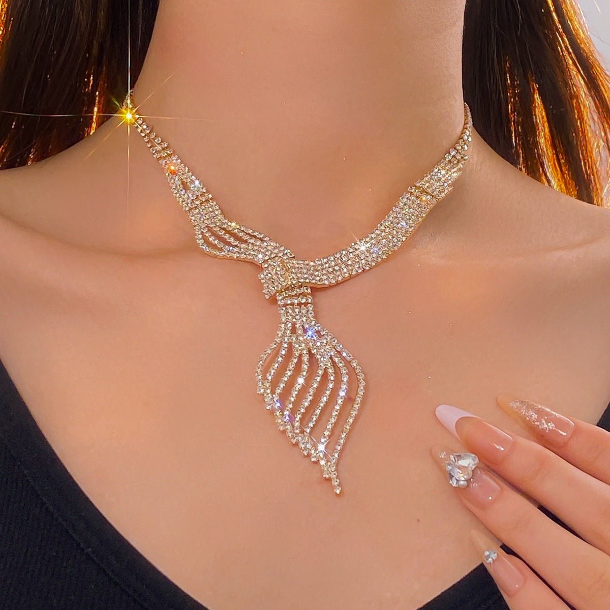 Diamond Clavicle Chain Necklace & Earrings Set by CJ | 0 from Luxe Lane | SKU: CJLX246770501AZ | Barcode:  | Options: Gold | Elegant diamond necklace on a model with a close - up of a hand holding a diamond ring.