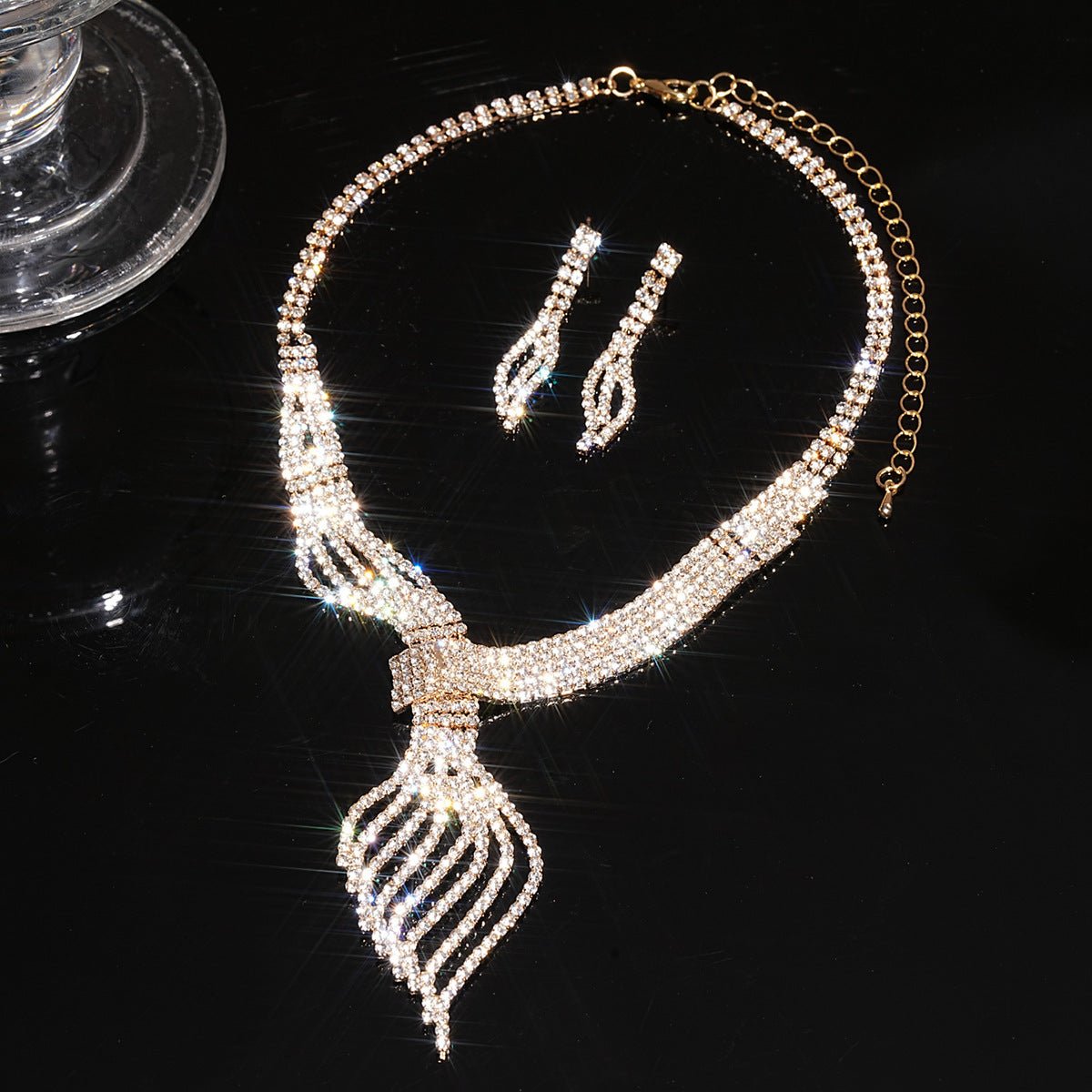 Diamond Clavicle Chain Necklace & Earrings Set by CJ | 0 from Luxe Lane | SKU: CJLX246770501AZ | Barcode:  | Options: Gold | Necklace and earrings set on a black background