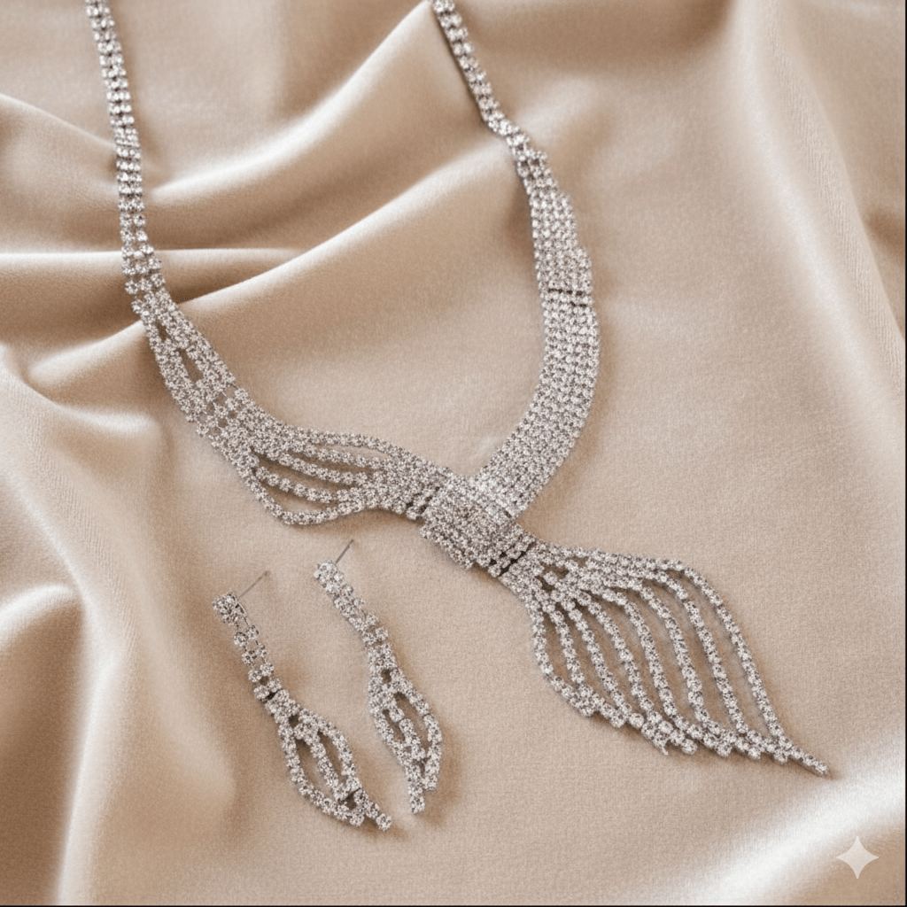 Diamond Clavicle Chain Necklace & Earrings Set by CJ | 0 from Luxe Lane | SKU: CJLX246770501AZ | Barcode:  | Options: Gold | Silver necklace and earrings set on a beige fabric background
