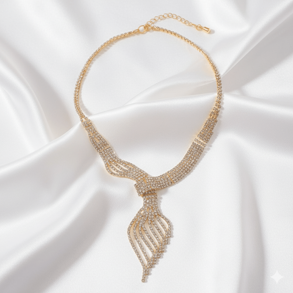 Diamond Clavicle Chain Necklace & Earrings Set by CJ | 0 from Luxe Lane | SKU: CJLX246770501AZ | Barcode:  | Options: Gold | Gold necklace with intricate design on a white fabric background