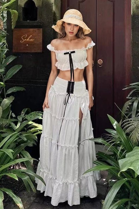 Elan Blanche Ruffle Set by Shine | one set from Luxe Lane | SKU:  | Barcode:  | Options: White XS | Elegant Formal Event Vacation Wear 2 Piece Set Chic White Ruffled Bandeau Top and Layered Long Skirt Set With Black Bow Straps