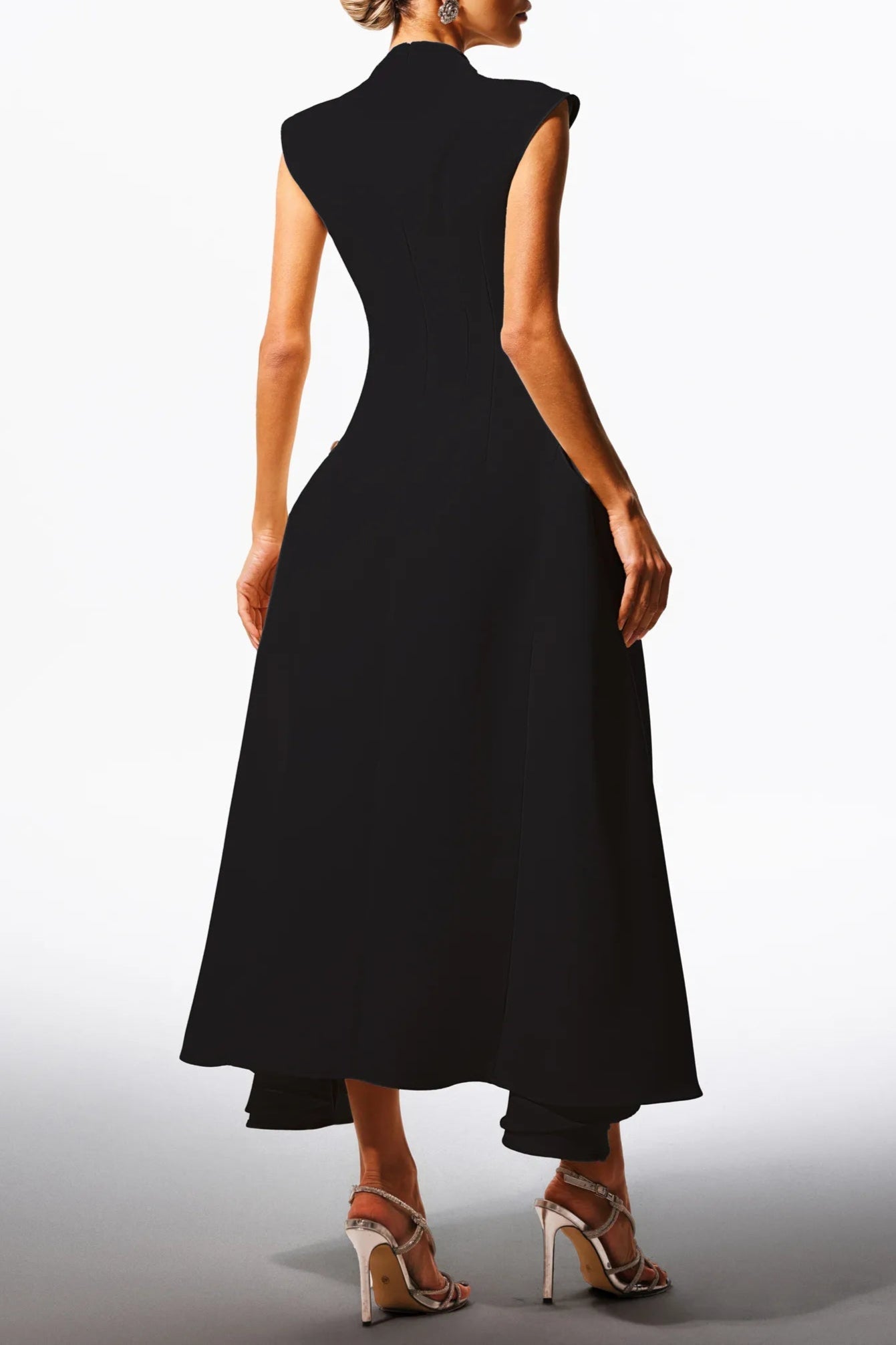 Elara Slanted Collar Ruffle Midi Dress by Luxe Lane | from Luxe Lane | SKU:  | Barcode:  | Options: White S | Woman wearing a black dress on a white background