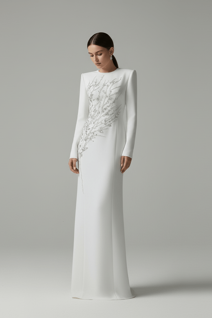 Elaria Beaded Rhinestone Floral Gown by Shine | from Luxe Lane | SKU: W11288-1 | Barcode:  | Options: White S | Woman wearing a white evening gown with intricate detailing on a gray background