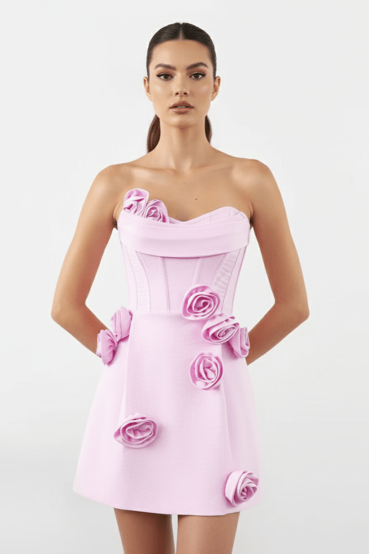 Evelisse Floral AppliqueMini Dress by Shine | from Luxe Lane | SKU: -1 | Barcode:  | Options: White S | Pink strapless dress with floral embellishments worn by a model on a white background