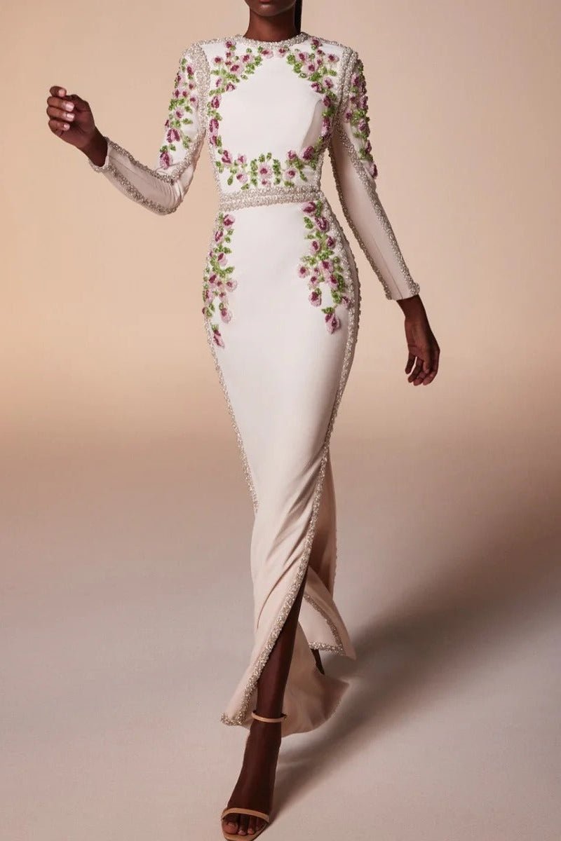 Floral Embroidered Long Sleeve Bodycon Maxi Evening Dress by Luxe Lane | Party dresses from Luxe Lane | SKU: W11638-1 | Barcode:  | Options: White S(2) | White evening gown with floral embroidery on a beige background