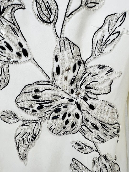 Floral Embroidered Long Sleeve Mermaid Evening Gown by Luxe Lane | Party dresses from Luxe Lane | SKU: W11304-1 | Barcode:  | Options: White S(6) | Elegant White Mermaid Evening Gown Black Floral Embroidery Long Sleeve Formal Maxi Dress for Weddings Banquets Red Carpet Events