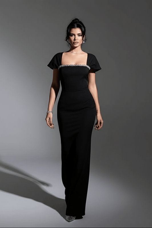 French Bandage Evening Gown by Luxe Lane | from Luxe Lane | SKU:  | Barcode:  | Options: Red XS | Woman wearing a black evening gown against a gray background