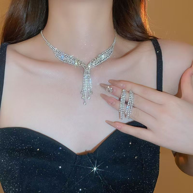 Fringe Rhinestone Necklace & Earrings Set by CJ | 0 from Luxe Lane | SKU: CJLX246751501AZ | Barcode:  | Options: Silver Set | Fringe Rhinestone Necklace & Earrings Set