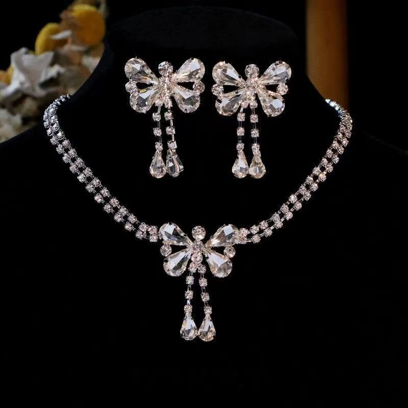 Fringe Rhinestone Necklace & Earrings Set by CJ | 0 from Luxe Lane | SKU: CJLX246751507GT | Barcode:  | Options: Silver Set F | Fringe Rhinestone Necklace & Earrings Set