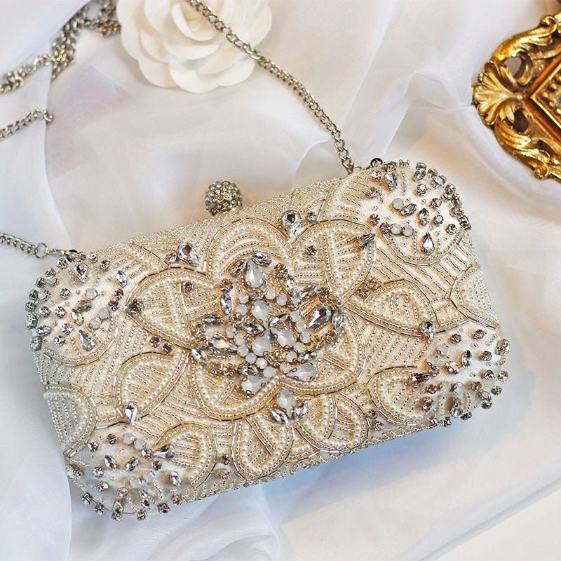 Hand Sewn Rhinestone Chain Evening Clutch by CJ | 0 from Luxe Lane | SKU: CJNS156141201AZ | Barcode:  | Options: Silver | Hand Sewn Rhinestone Chain Evening Clutch