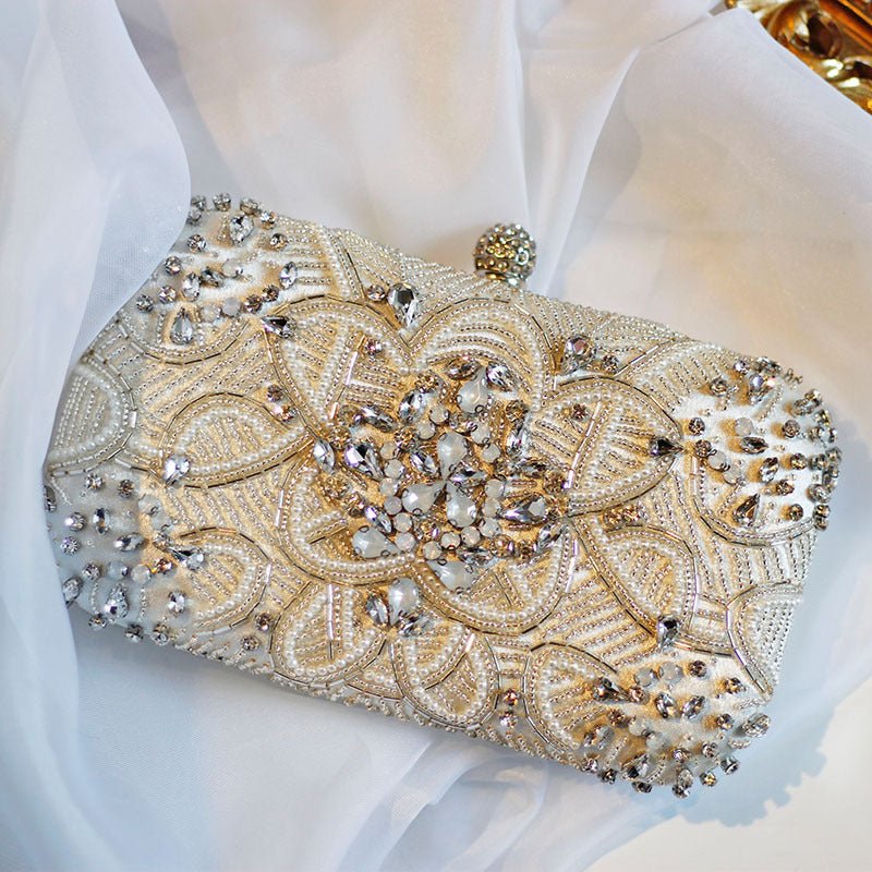 Hand Sewn Rhinestone Chain Evening Clutch by CJ | 0 from Luxe Lane | SKU: CJNS156141201AZ | Barcode:  | Options: Silver | Hand Sewn Rhinestone Chain Evening Clutch