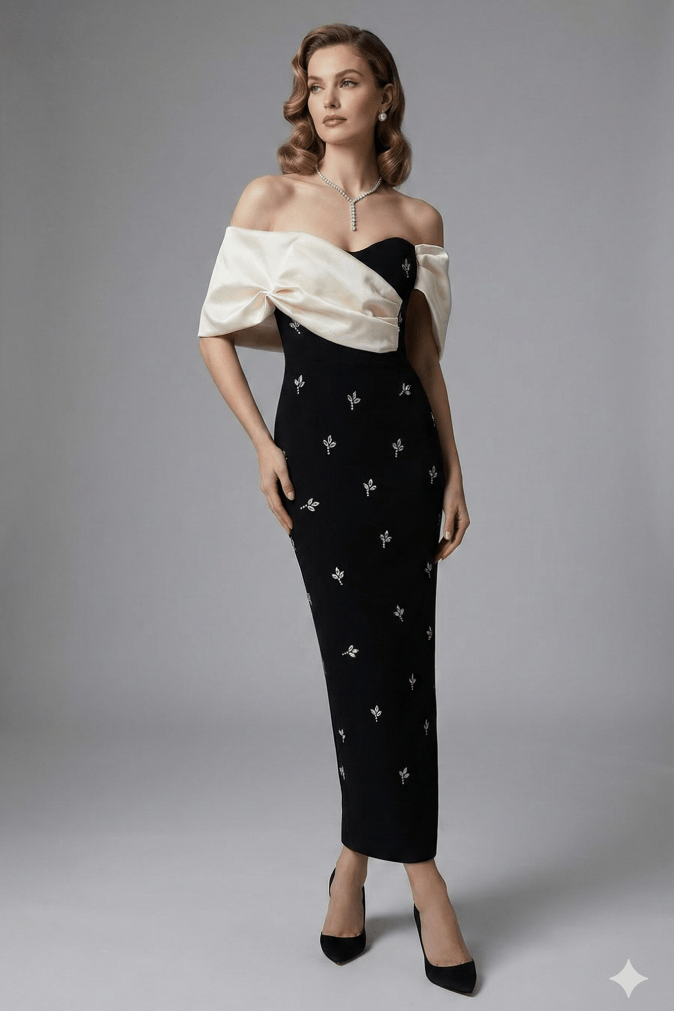 Isadora Off - Shoulder Beaded Bodycon Maxi Dress by luxe lane | from Luxe Lane | SKU: -1 | Barcode:  | Options: Black S(2) | Woman wearing a black and white off - shoulder dress with star patterns on a gray background