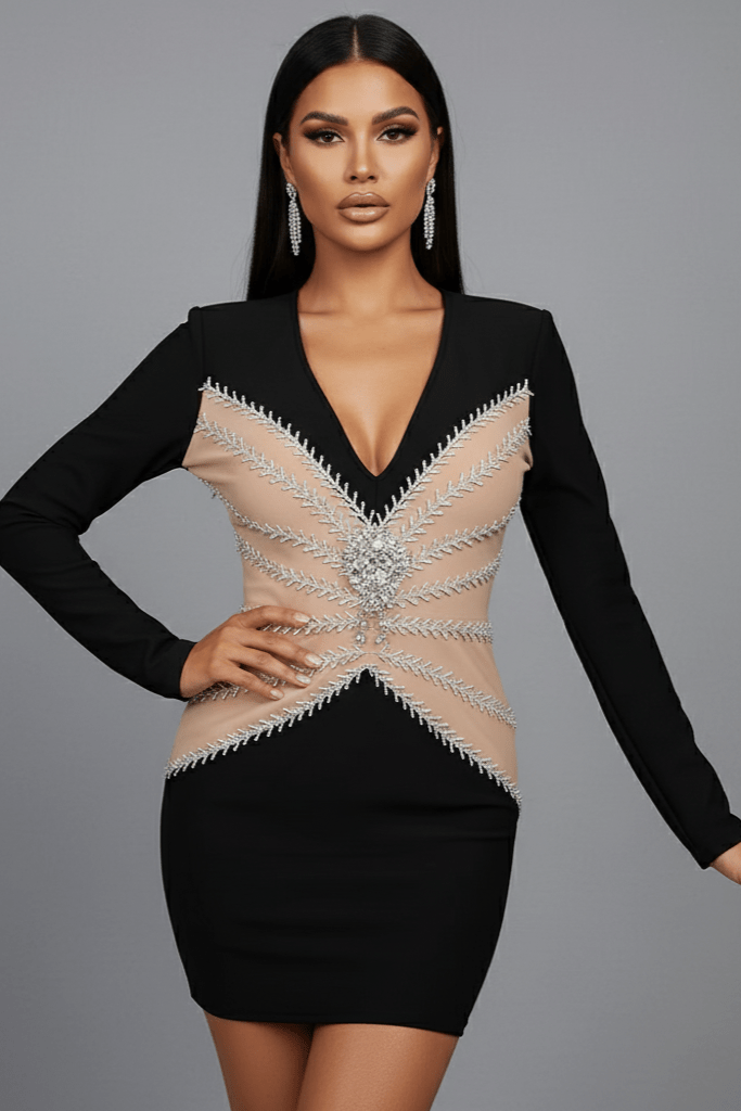 Ivory Halo Beaded Mini Club Dress by Luxe Lane | from Luxe Lane | SKU:  | Barcode:  | Options: Black S | Woman wearing a black dress with beige embellishments on a gray background