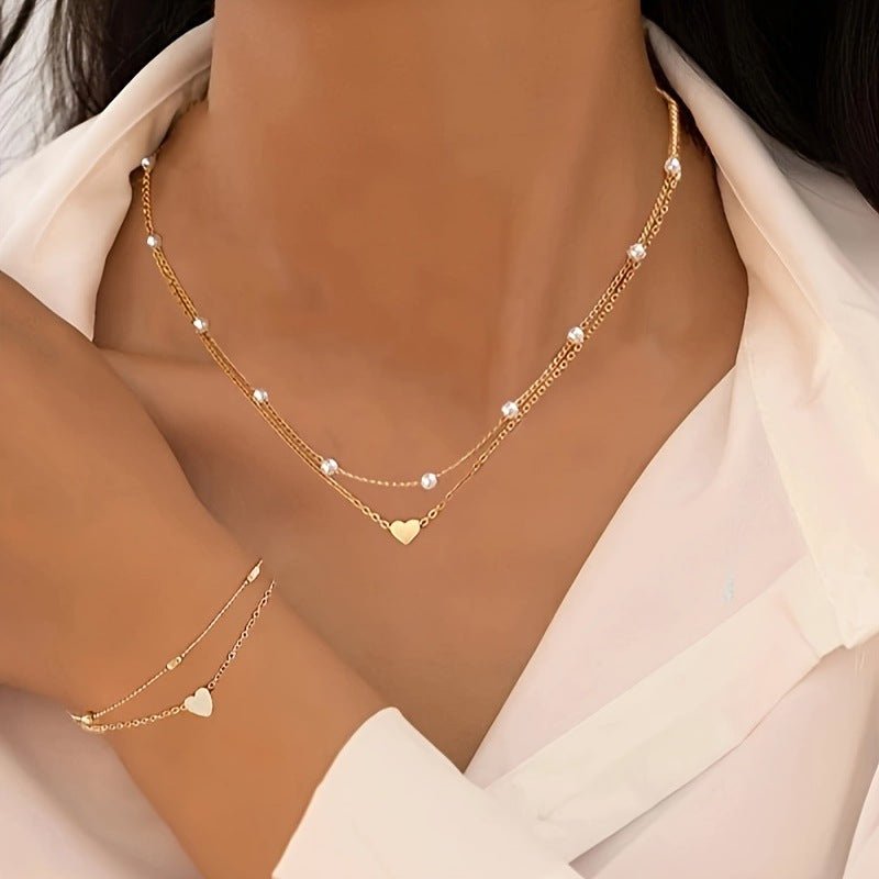 Layered Pearl Necklace & Bracelet Jewelry Set by CJ | 0 from Luxe Lane | SKU: CJLX256224702BY | Barcode:  | Options: Gold | Layered Pearl Necklace & Bracelet Jewelry Set