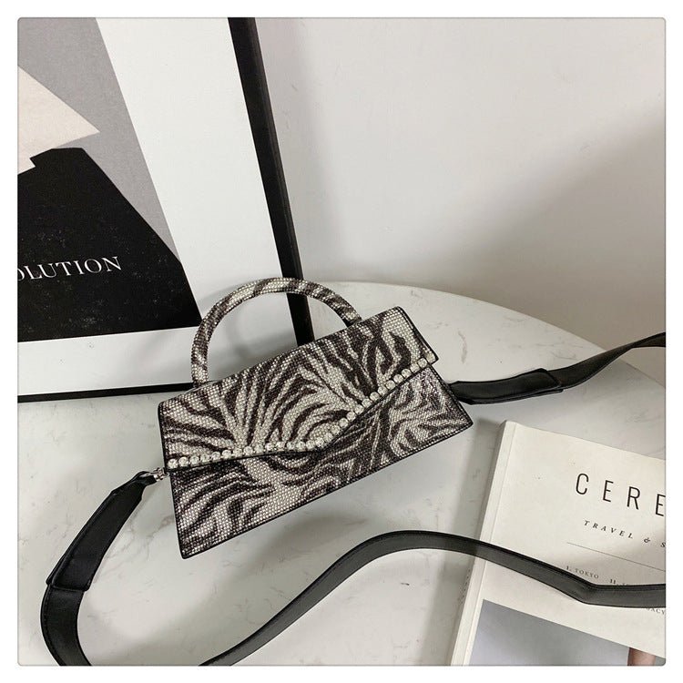 Leopard Diamond Inlay Leather Evening Bag by CJ | 0 from Luxe Lane | SKU: CJNS165329201AZ | Barcode:  | Options: One size | Leopard Diamond Inlay Leather Evening Bag