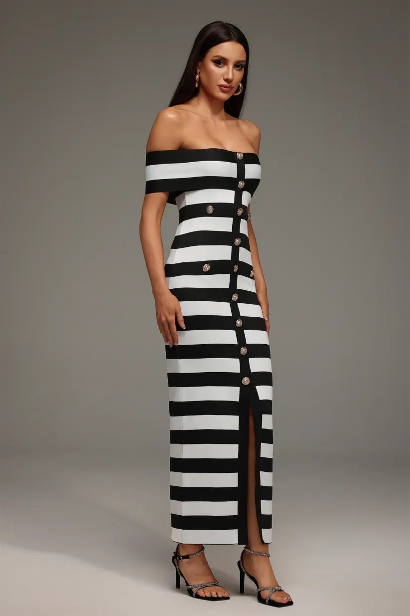 Noirelle Off - Shoulder Button Bandage Maxi Dress by Luxe Lane | from Luxe Lane | SKU: -1 | Barcode:  | Options: Black white S(2) | Woman wearing a black and white striped dress with buttons on a gray background