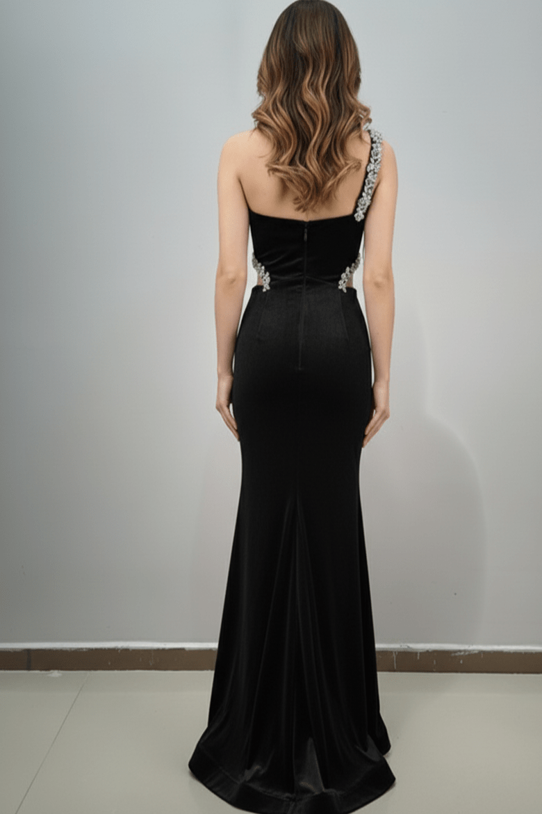 Novara Crystal Velvet Mermaid Gown by Luxe Lane | Party dresses from Luxe Lane | SKU:  | Barcode:  | Options: Black S | Woman wearing a black evening gown with a gray background