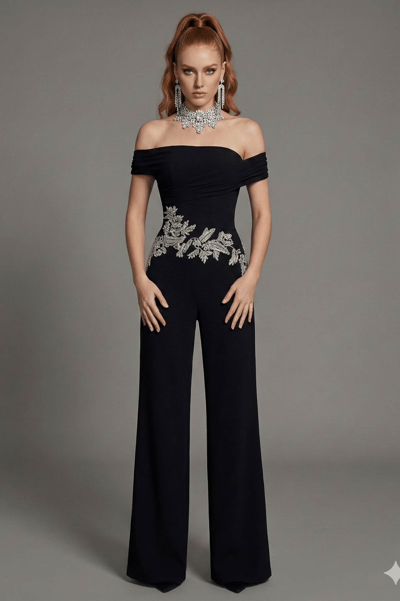 Off - Shoulder Rhinestone Wide - Leg Party Jumpsuit by Shine | Jumpsuit from Luxe Lane | SKU: -1 | Barcode:  | Options: Black S(2) | Woman wearing a black off - shoulder jumpsuit with silver embellishments on a gray background