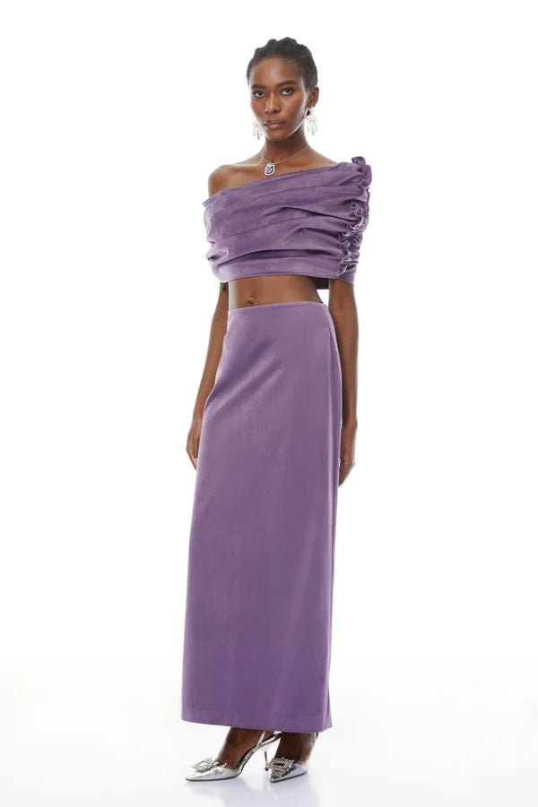 Off - Shoulder Ruched Velvet Two - Piece Maxi Skirt Set by Shine | one set from Luxe Lane | SKU: -1 | Barcode:  | Options: Purple S(2) | Woman wearing a purple off - shoulder top and long skirt on a white background