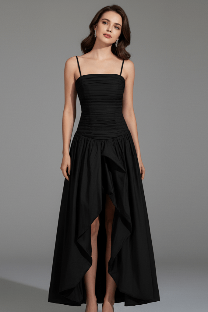 Pleated Corset Maxi Gown by Luxe Lane | from Luxe Lane | SKU:  | Barcode:  | Options: Black S | Woman wearing a black dress against a gray background